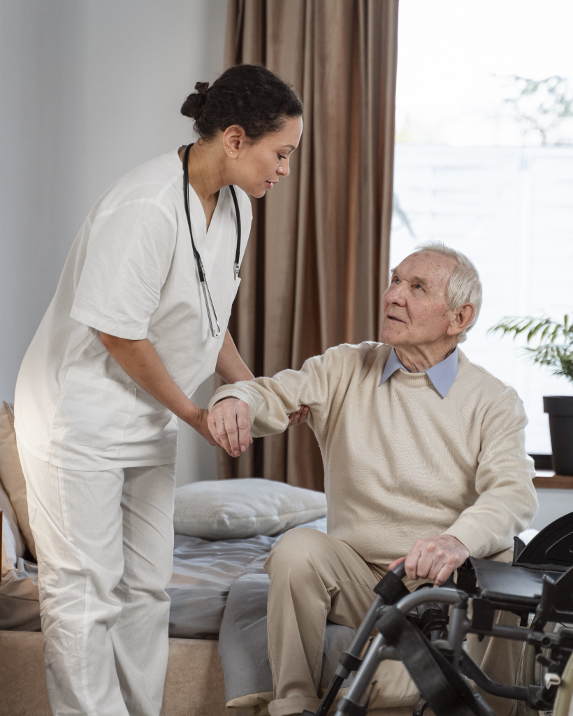 male-nurse-helping-senior-woman-with-walking-stick-1-rda9d8qzttje39bzynkpf4xa3ut4dnb0ixsij9ya68